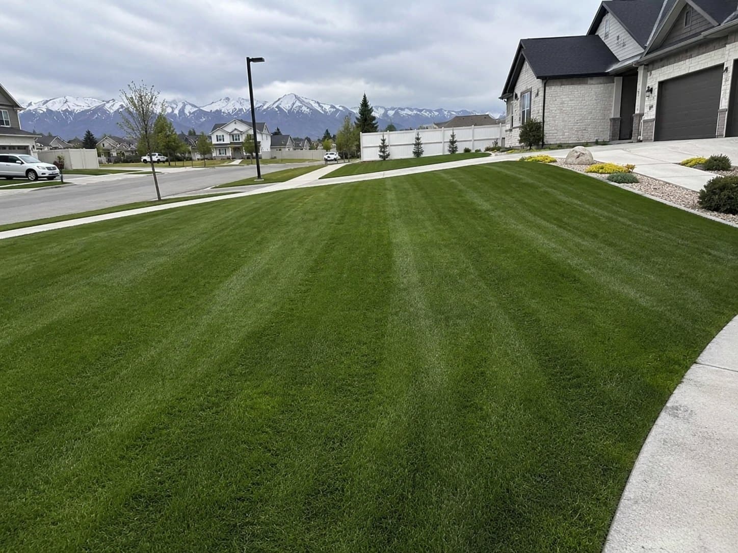 Deep green lawn after a seasonal fertilizer application — Young Buck Lawn Care, Rexburg, Idaho